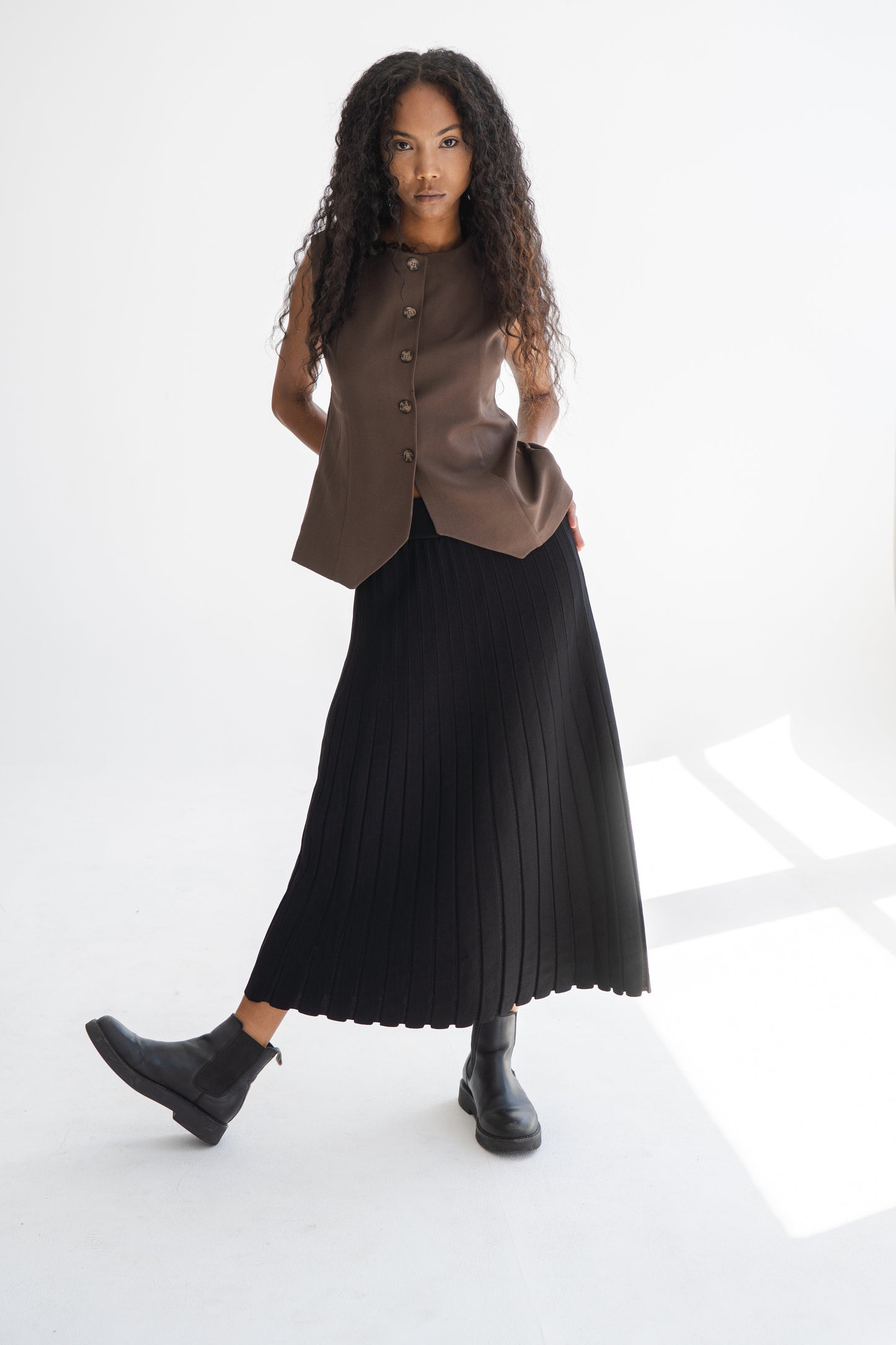 PLEATED KNIT SKIRT WITH SHIMMER DETAIL
